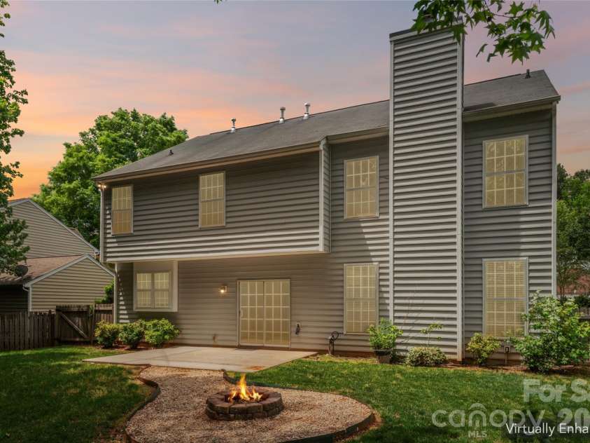 1206 Arrow Lake Court, Fort Mill, SC 29707.  MLS# CAR4371326, YatesRealty ID 19622. Backyard with firepit