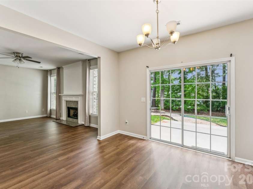 1206 Arrow Lake Court, Fort Mill, SC 29707.  MLS# CAR4371326, YatesRealty ID 19622. Dining area overlooking backyard