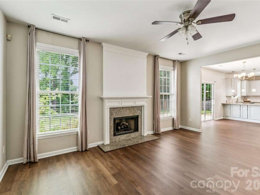 1206 Arrow Lake Court, Fort Mill, SC 29707.  MLS# CAR4371326, YatesRealty ID 19622. Living room with gas fireplace