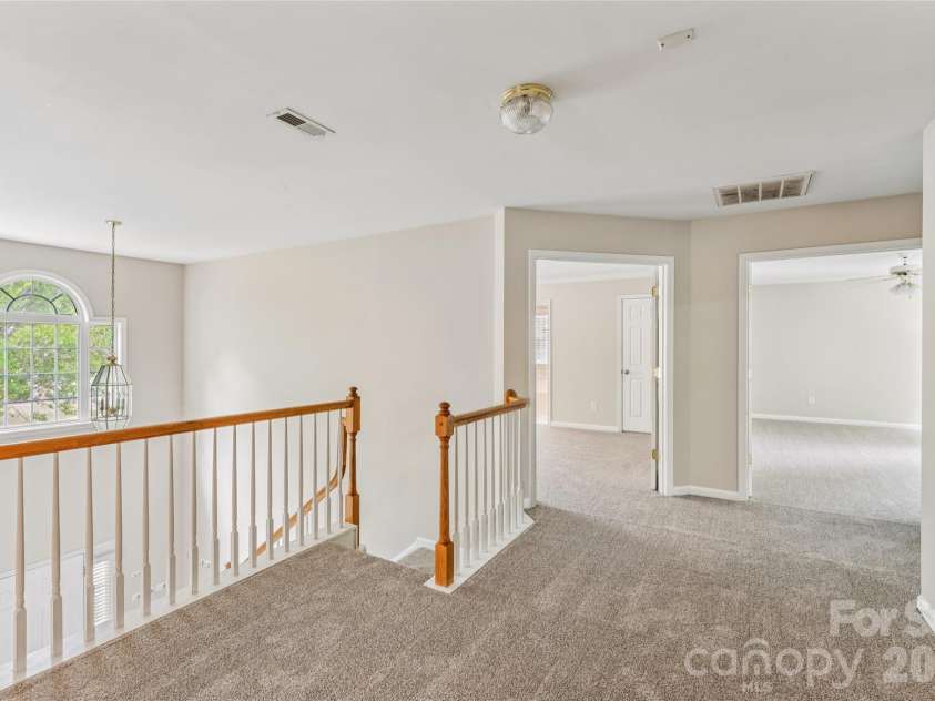 1206 Arrow Lake Court, Fort Mill, SC 29707.  MLS# CAR4371326, YatesRealty ID 19622. Second floor landing