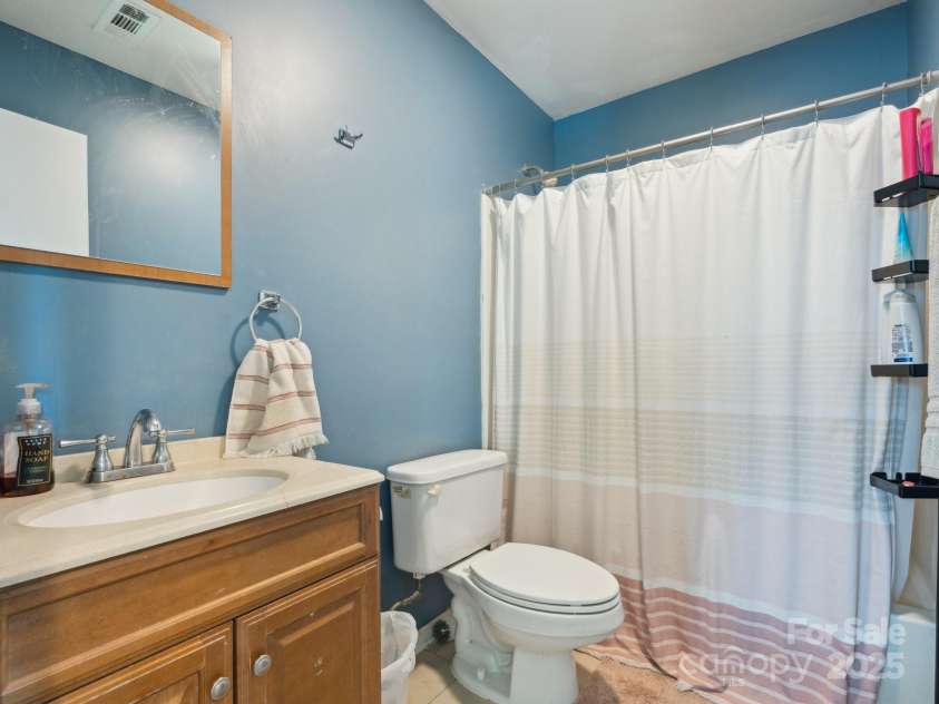 5701 Silver Eagle Drive, Charlotte, NC 28214.  MLS# CAR4269905, YatesRealty ID 19626. Guest Bathroom
