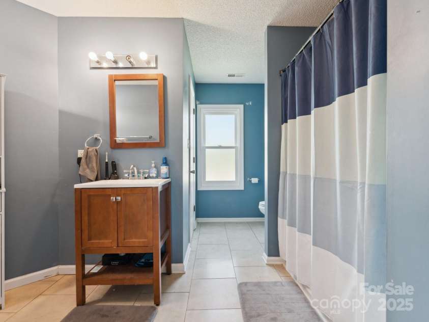 5701 Silver Eagle Drive, Charlotte, NC 28214.  MLS# CAR4269905, YatesRealty ID 19626. Primary Bathroom