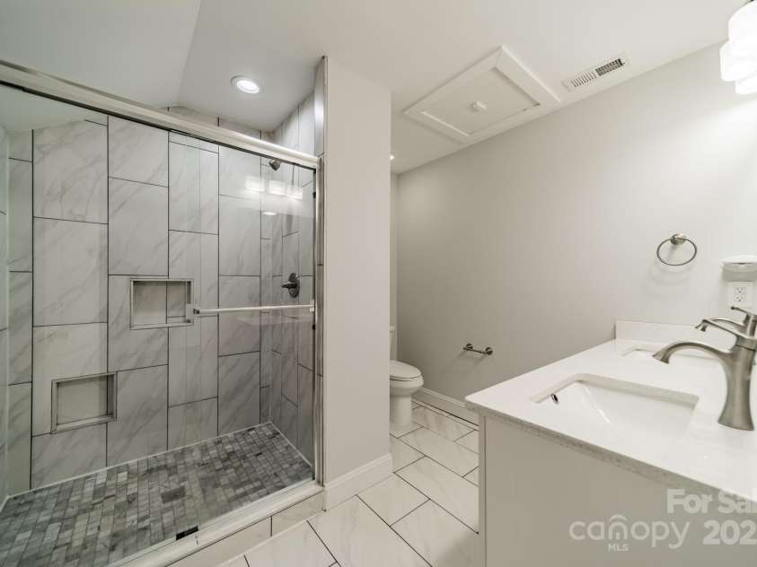 7901 Reames Road, Charlotte, NC 28216.  MLS# CAR4261222, YatesRealty ID 19628. Primary bathroom