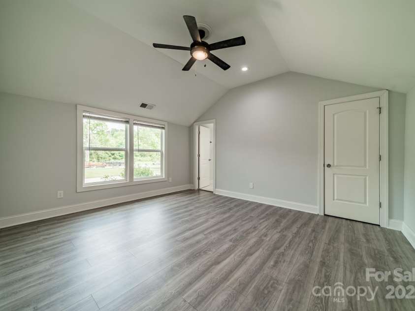 7901 Reames Road, Charlotte, NC 28216.  MLS# CAR4261222, YatesRealty ID 19628. Primary bedroom