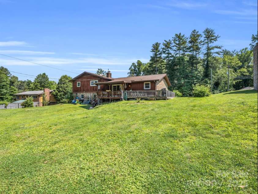 2512 Brevard Road, Hendersonville, NC 28791.  MLS# CAR4237635, YatesRealty ID 19632. Beautiful lawn