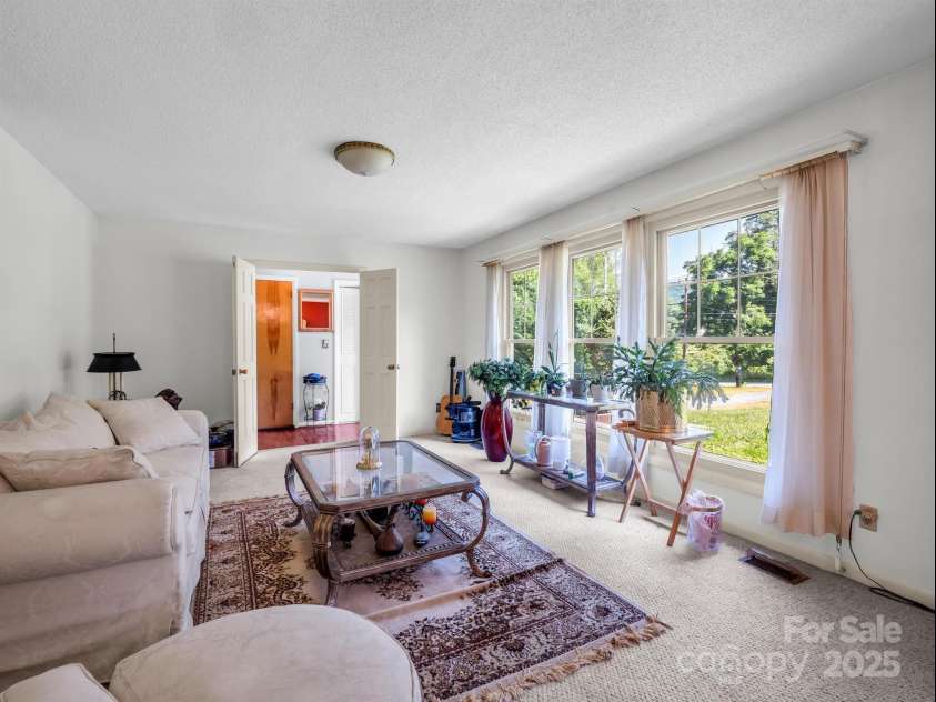 2512 Brevard Road, Hendersonville, NC 28791.  MLS# CAR4237635, YatesRealty ID 19632. Formal living room