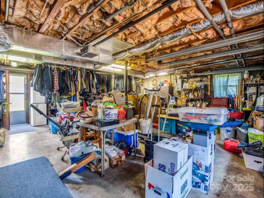 2512 Brevard Road, Hendersonville, NC 28791.  MLS# CAR4237635, YatesRealty ID 19632. Oversized garage with exterior access