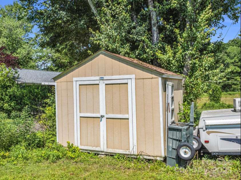 2512 Brevard Road, Hendersonville, NC 28791.  MLS# CAR4237635, YatesRealty ID 19632. Shed included