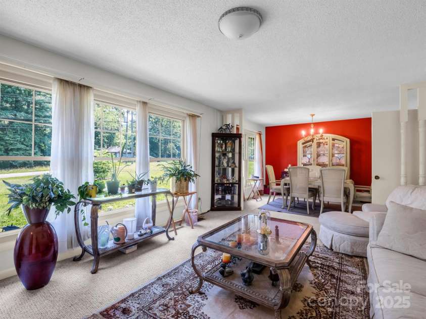 2512 Brevard Road, Hendersonville, NC 28791.  MLS# CAR4237635, YatesRealty ID 19632. Wall of windows