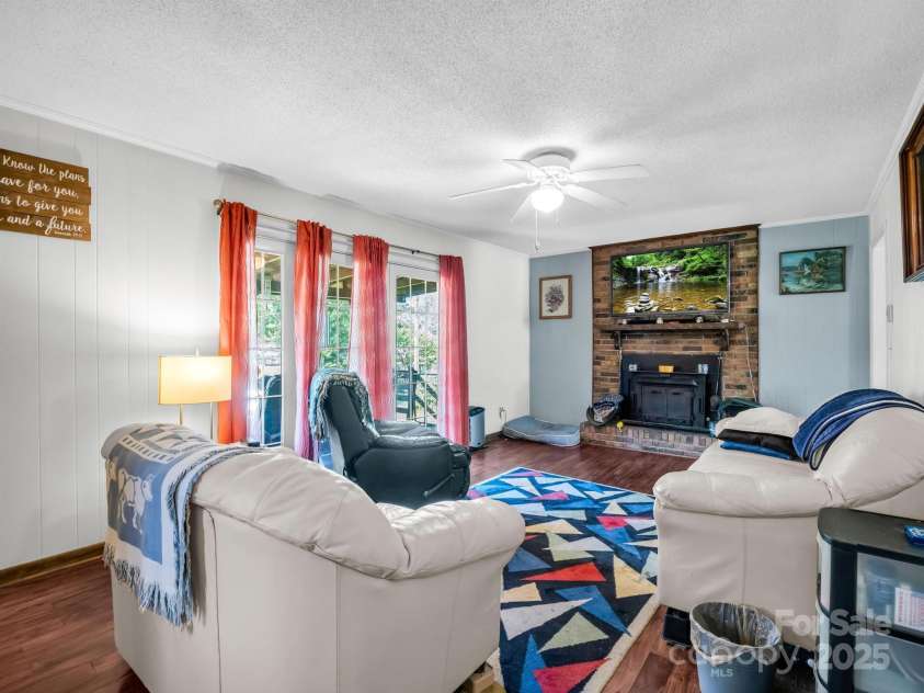 2512 Brevard Road, Hendersonville, NC 28791.  MLS# CAR4237635, YatesRealty ID 19632. Woodburning fireplace