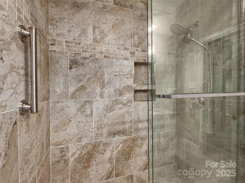 9 Kit Court, Fletcher, NC 28732.  MLS# CAR4246263, YatesRealty ID 19633. Downstairs Shower