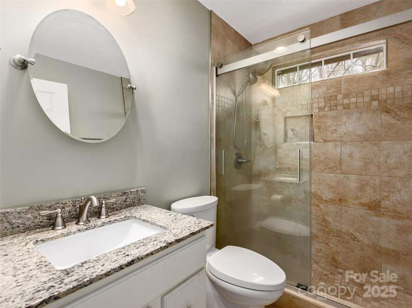 9 Kit Court, Fletcher, NC 28732.  MLS# CAR4246263, YatesRealty ID 19633. Guest Bath