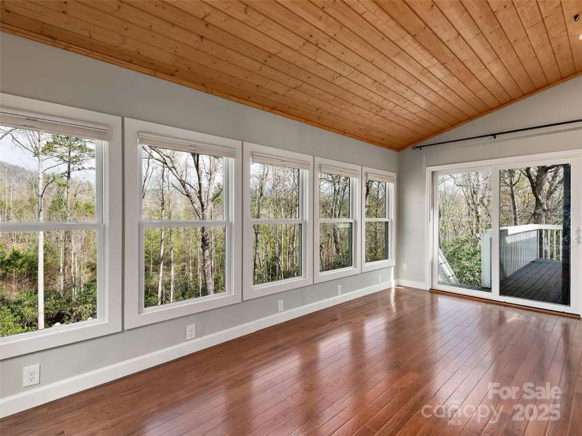 9 Kit Court, Fletcher, NC 28732.  MLS# CAR4246263, YatesRealty ID 19633. Sunroom