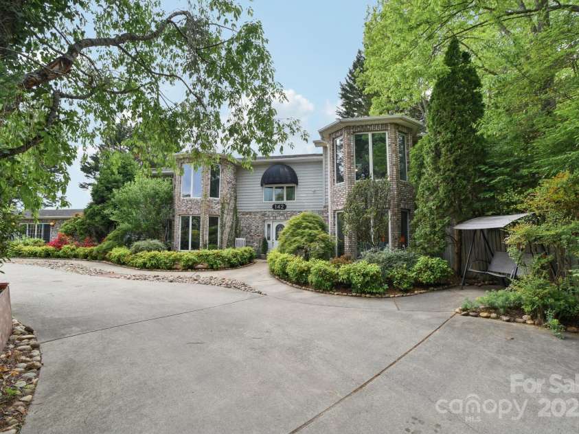 142 Justice Street, Fletcher, NC 28732.  MLS# CAR4234693, YatesRealty ID 19634. A peaceful and secluded retreat