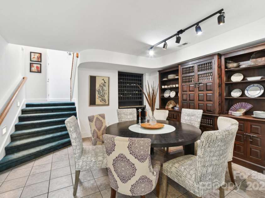 142 Justice Street, Fletcher, NC 28732.  MLS# CAR4234693, YatesRealty ID 19634. Beautiful built-in wine rack