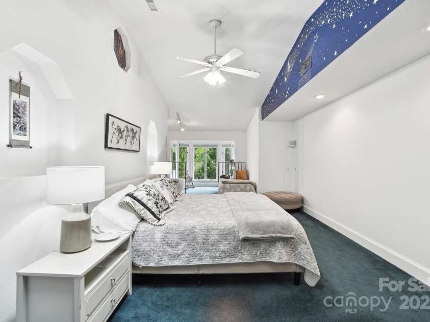 142 Justice Street, Fletcher, NC 28732.  MLS# CAR4234693, YatesRealty ID 19634. Enjoy a peaceful escape with a cozy sitting nook, walk-in closet, and spa-like ensuite bath