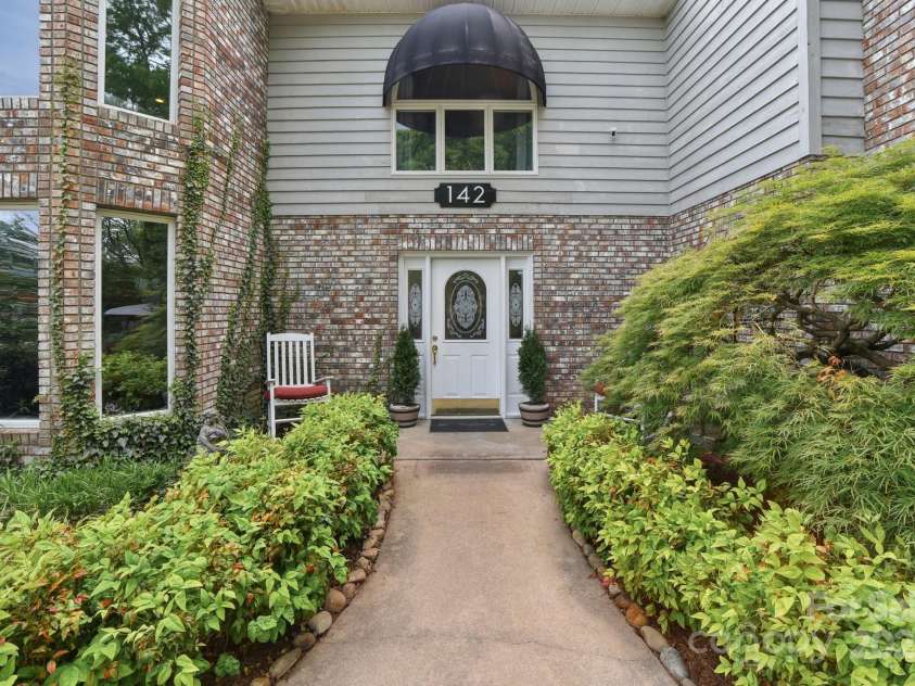 142 Justice Street, Fletcher, NC 28732.  MLS# CAR4234693, YatesRealty ID 19634. Generously sized 4BD/4BA home is set on a 0.44-acre lot