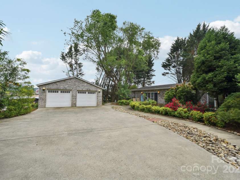 142 Justice Street, Fletcher, NC 28732.  MLS# CAR4234693, YatesRealty ID 19634. Plenty of parking and turnaround space