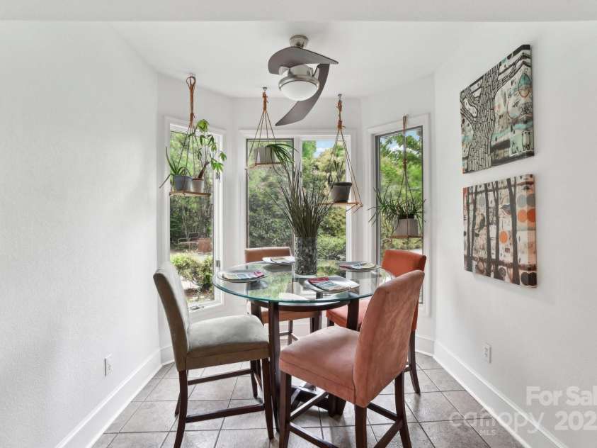 142 Justice Street, Fletcher, NC 28732.  MLS# CAR4234693, YatesRealty ID 19634. Start your day off in this brightly-lit, cheery breakfast area