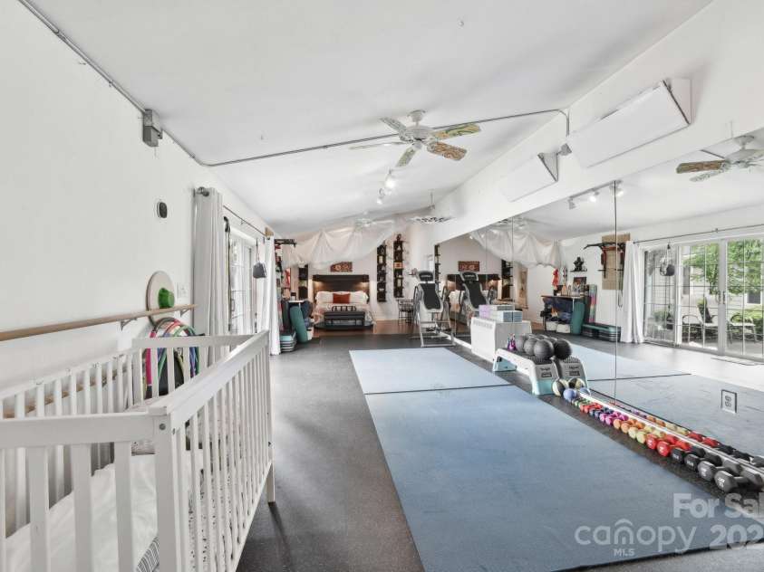 142 Justice Street, Fletcher, NC 28732.  MLS# CAR4234693, YatesRealty ID 19634. This space is thoughtfully designed for versatility