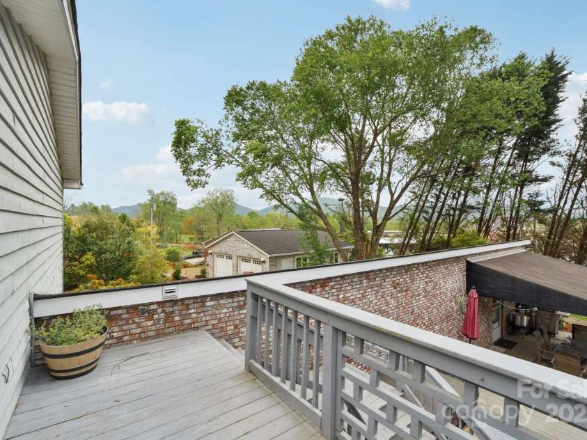 142 Justice Street, Fletcher, NC 28732.  MLS# CAR4234693, YatesRealty ID 19634. Wonderful back deck to take in the views