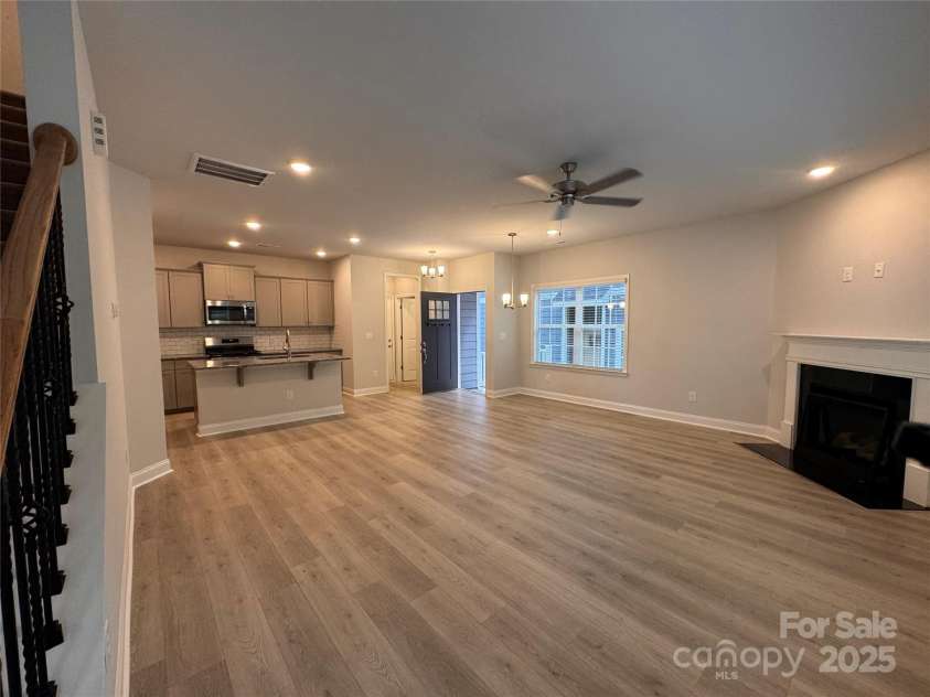 4029 Port Richmond Avenue, Gastonia, NC 28056.  MLS# CAR4259884, YatesRealty ID 19640. Family room looking towards kitchen and front door