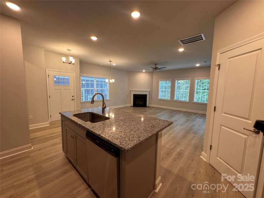 4029 Port Richmond Avenue, Gastonia, NC 28056.  MLS# CAR4259884, YatesRealty ID 19640. Kitchen island looking toward family room
