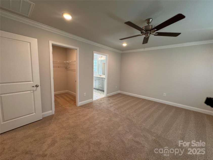 4029 Port Richmond Avenue, Gastonia, NC 28056.  MLS# CAR4259884, YatesRealty ID 19640. Primary bedroom and 1st walk-in closet