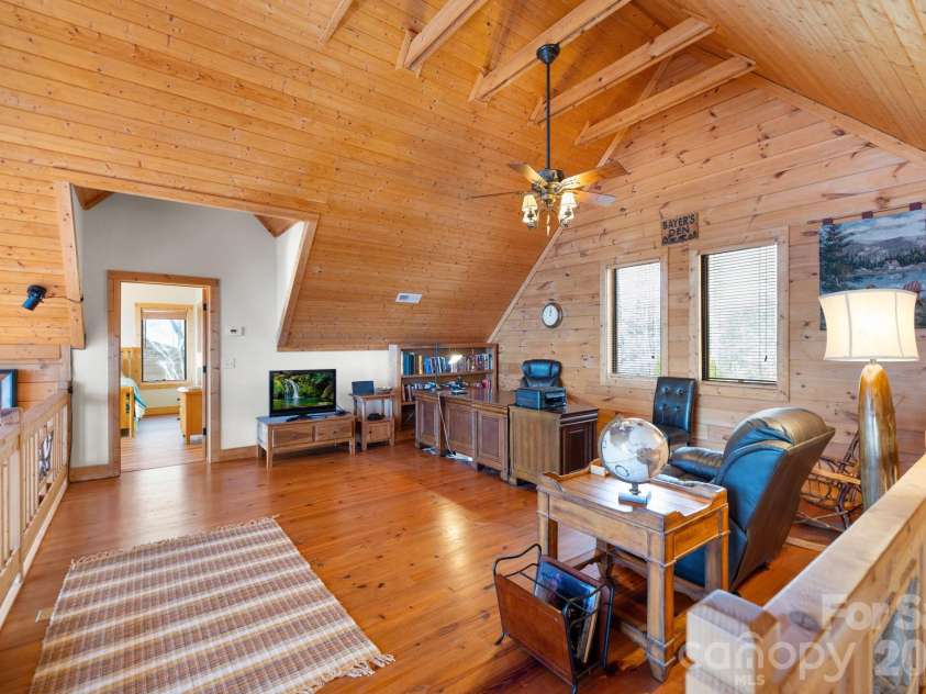 277 Kestrel Court, Sapphire, NC 28774.  MLS# CAR4362703, YatesRealty ID 19641. Upper level office and open space with balcony.
