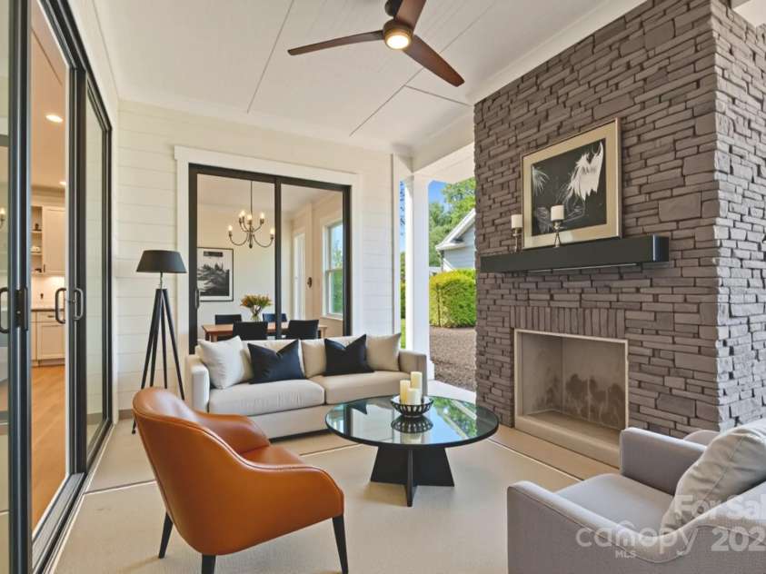 13217 Terrace Court Drive, Charlotte, NC 28278.  MLS# CAR4154069, YatesRealty ID 19646. Covered terrace with gas fireplace