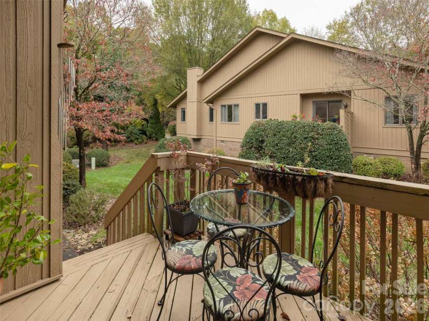 606 Red Oak Drive, Hendersonville, NC 28791.  MLS# CAR4317264, YatesRealty ID 19646. Grilling deck with alfresco dining space