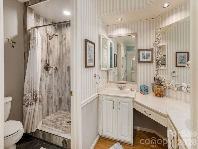 606 Red Oak Drive, Hendersonville, NC 28791.  MLS# CAR4317264, YatesRealty ID 19646. Tiled shower
