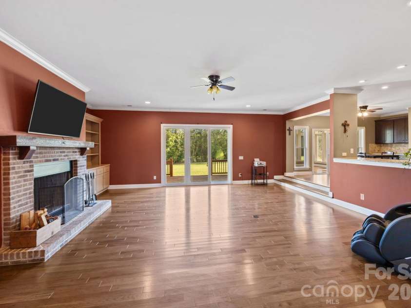 255 Woodlea Court, Mooresville, NC 28115.  MLS# CAR4367240, YatesRealty ID 19653. Open floorplan leading to back deck
