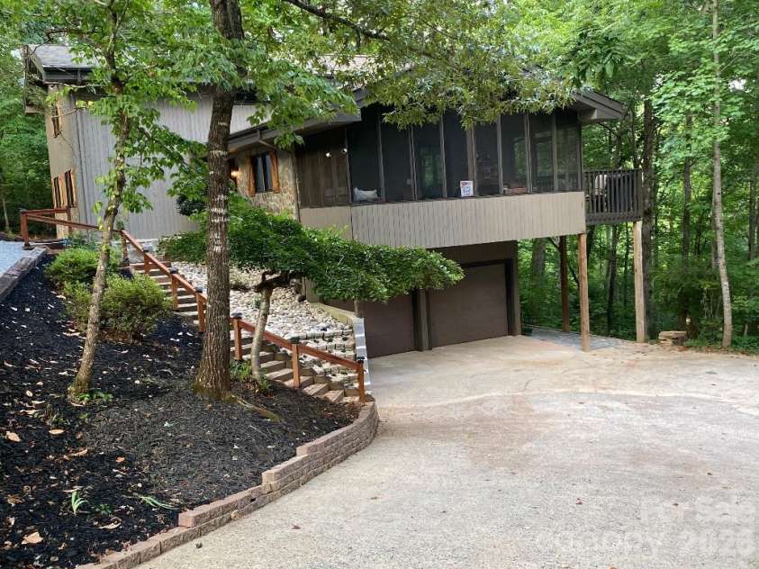 394 Jonathan Lane, Lake Lure, NC 28746.  MLS# CAR4366415, YatesRealty ID 19657. 