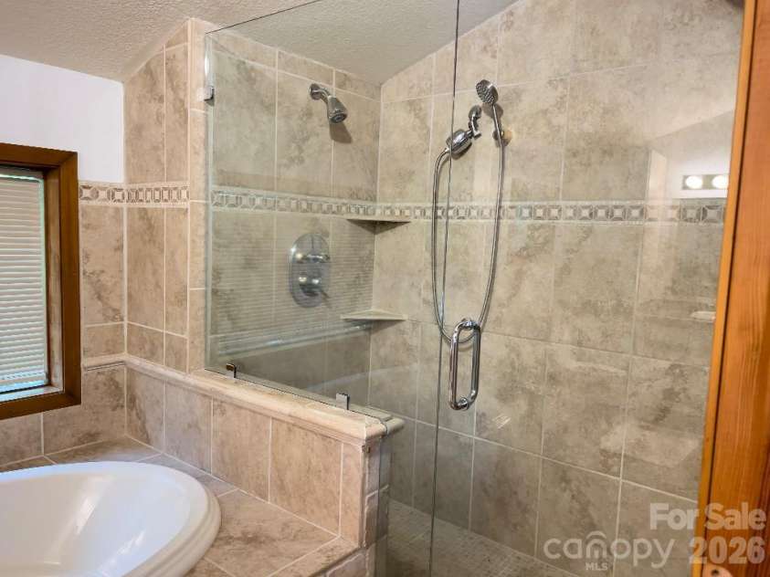 394 Jonathan Lane, Lake Lure, NC 28746.  MLS# CAR4366415, YatesRealty ID 19657. 