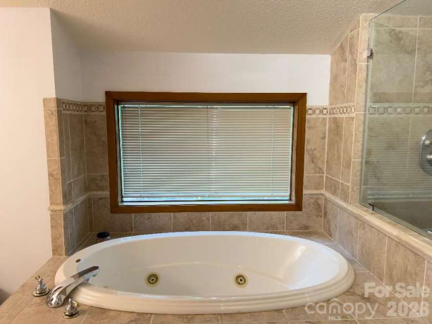 394 Jonathan Lane, Lake Lure, NC 28746.  MLS# CAR4366415, YatesRealty ID 19657. 