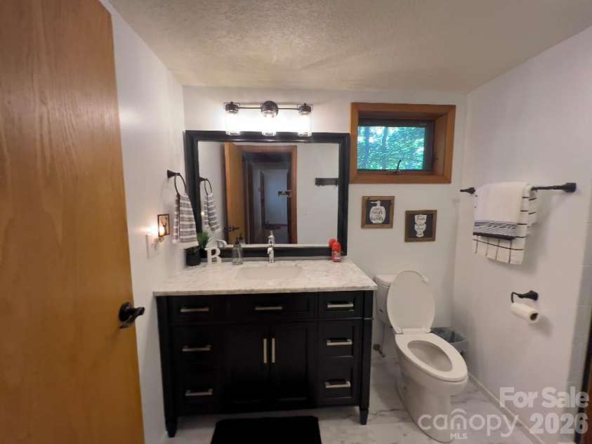 394 Jonathan Lane, Lake Lure, NC 28746.  MLS# CAR4366415, YatesRealty ID 19657. 