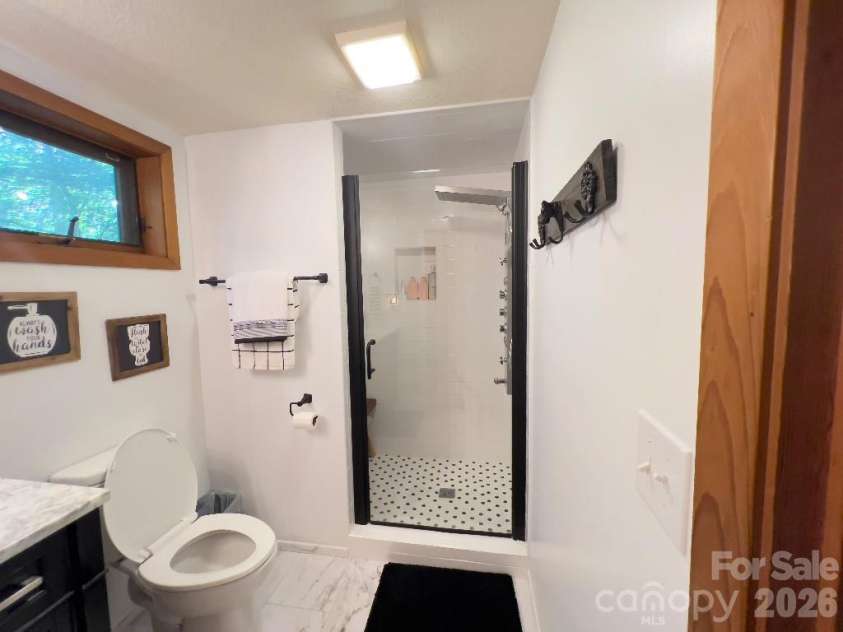 394 Jonathan Lane, Lake Lure, NC 28746.  MLS# CAR4366415, YatesRealty ID 19657. 