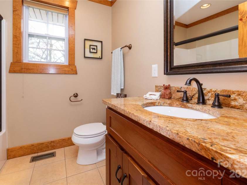 15 Weaver Hill Road, Asheville, NC 28805.  MLS# CAR4217723, YatesRealty ID 1966. Hall Bathroom