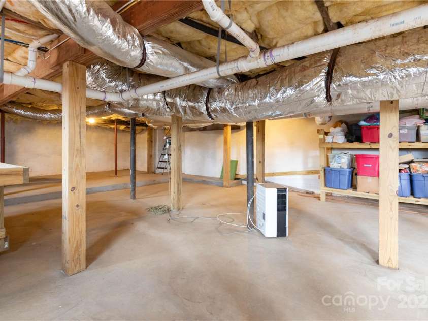 15 Weaver Hill Road, Asheville, NC 28805.  MLS# CAR4217723, YatesRealty ID 1966. Large storage basement