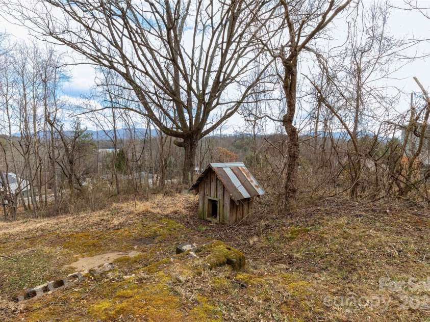 15 Weaver Hill Road, Asheville, NC 28805.  MLS# CAR4217723, YatesRealty ID 1966. Winter season back yard views