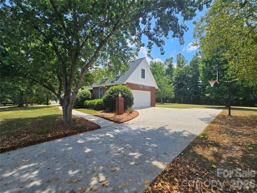 3486 Victorian Hills Drive, Richburg, SC 29729.  MLS# CAR4332522, YatesRealty ID 1966. Concrete Drive, Basketball Hoop, Mature Trees, Security 