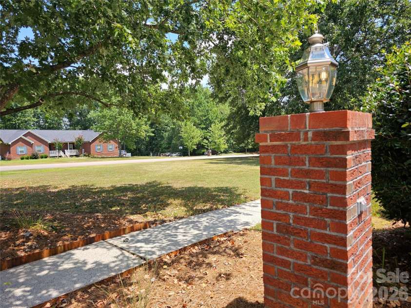 3486 Victorian Hills Drive, Richburg, SC 29729.  MLS# CAR4332522, YatesRealty ID 1966. Front Concrete Sidewalk, Brick Light Pillar