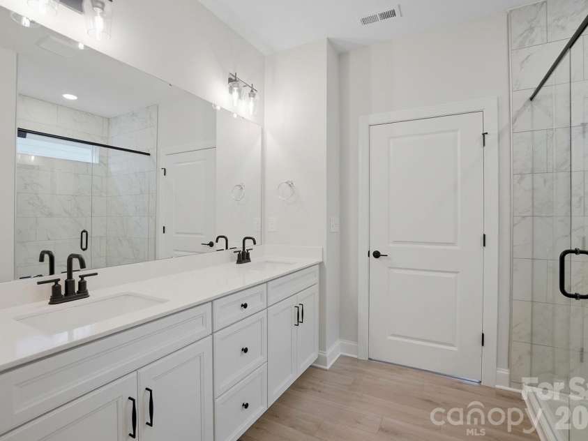 3066 Constitution Lane, Gastonia, NC 28056.  MLS# CAR4322846, YatesRealty ID 19661. Primary bathroom