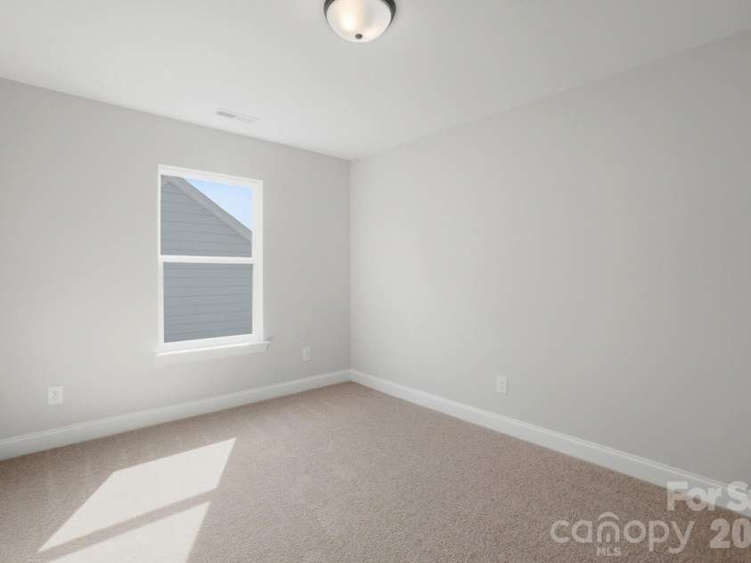 3066 Constitution Lane, Gastonia, NC 28056.  MLS# CAR4322846, YatesRealty ID 19661. Upstairs bedroom