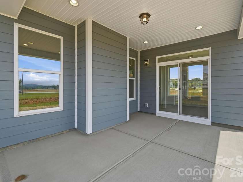 3057 Constitution Lane, Gastonia, NC 28056.  MLS# CAR4359289, YatesRealty ID 19663. Covered porch