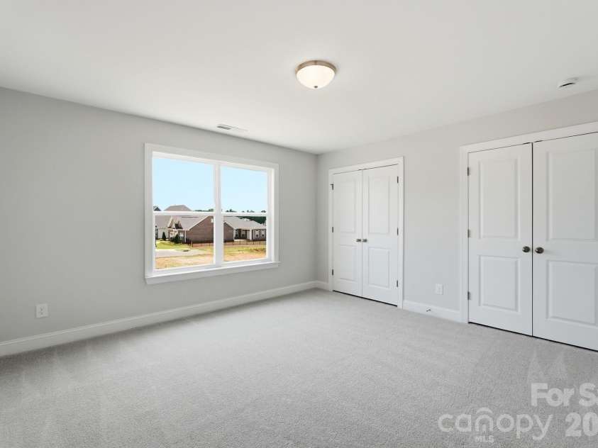 3057 Constitution Lane, Gastonia, NC 28056.  MLS# CAR4359289, YatesRealty ID 19663. Upper-level bedroom