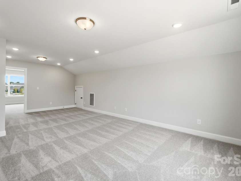 3057 Constitution Lane, Gastonia, NC 28056.  MLS# CAR4359289, YatesRealty ID 19663. Upper-level loft