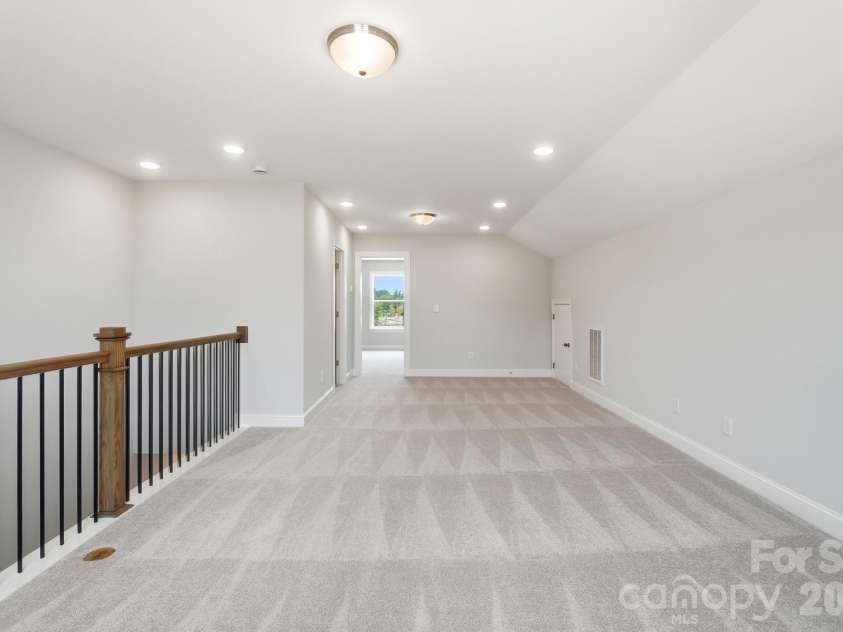 3057 Constitution Lane, Gastonia, NC 28056.  MLS# CAR4359289, YatesRealty ID 19663. Upper-level loft