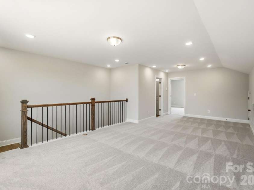 3057 Constitution Lane, Gastonia, NC 28056.  MLS# CAR4359289, YatesRealty ID 19663. Upper-level loft